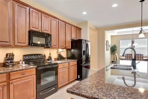 Kitchen - 5407 74th Pl E, Ellenton, FL 34222 photo 3 of 7