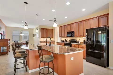 Kitchen - 5407 74th Pl E, Ellenton, FL 34222 photo 4 of 7