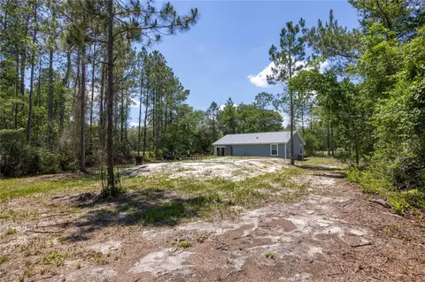 Exterior - 9025 SE County Road 221, Hampton, FL 32044 photo 5 of 6