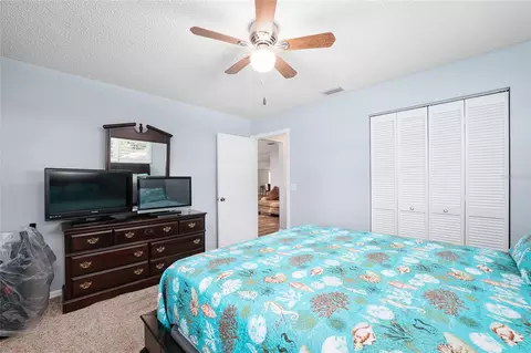 Bedroom - 9820 SW 89th Ter #E, Ocala, FL 34481 photo 2 of 4