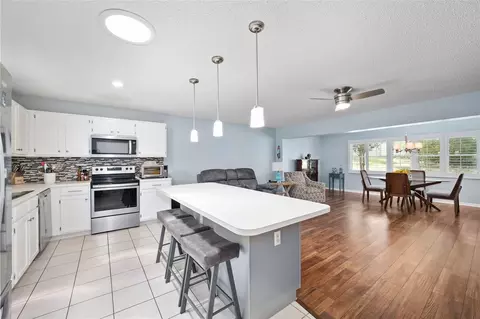 Kitchen - 9820 SW 89th Ter #E, Ocala, FL 34481 photo 7 of 7