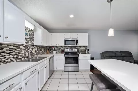 Kitchen - 9820 SW 89th Ter #E, Ocala, FL 34481 photo 6 of 7