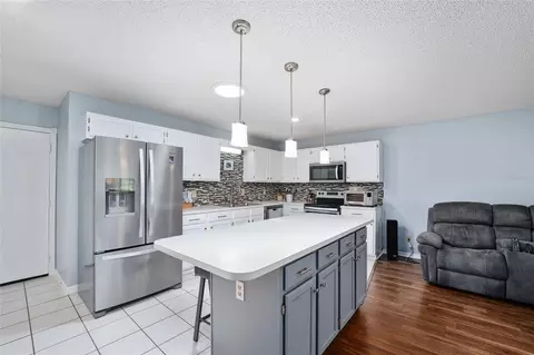 Kitchen - 9820 SW 89th Ter #E, Ocala, FL 34481 photo 3 of 7