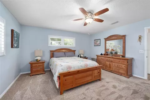 Bedroom - 9820 SW 89th Ter #E, Ocala, FL 34481 photo 3 of 4