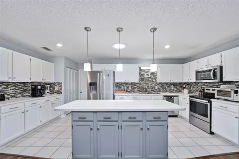 Kitchen - 9820 SW 89th Ter #E, Ocala, FL 34481 photo 2 of 7