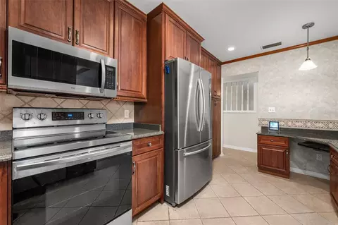 Kitchen - 7713 SW 9th Pl, Gainesville, FL 32607 photo 4 of 5
