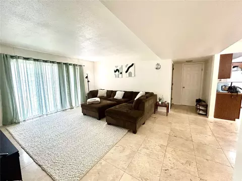 Living - 407 NW 39th Rd #407C, Gainesville, FL 32607 photo 3 of 3