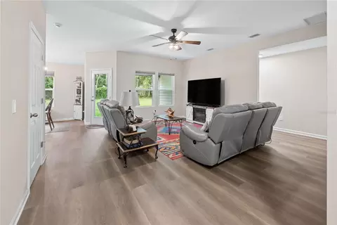 Living - 111 Breezeway Ave, Satsuma, FL 32189 photo 1 of 2