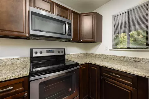 Kitchen - 83 SE 16th Ave #E202, Gainesville, FL 32601 photo 2 of 4