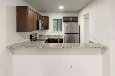 Kitchen - 83 SE 16th Ave #E202, Gainesville, FL 32601 photo 4 of 4