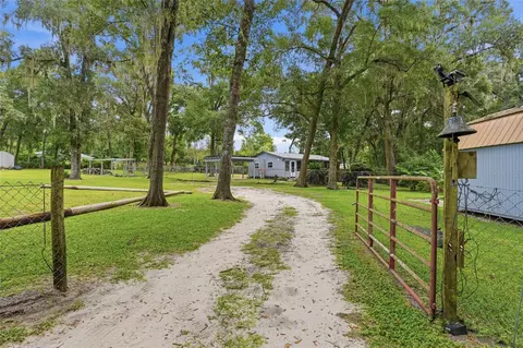 Exterior - 18467 NW 57th Ct, Reddick, FL 32686 photo 8 of 10