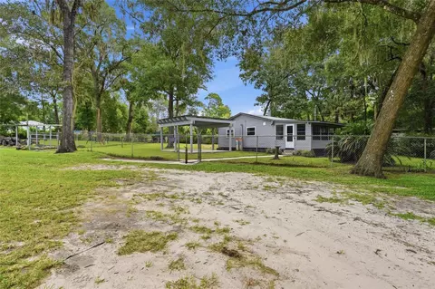 Exterior - 18467 NW 57th Ct, Reddick, FL 32686 photo 5 of 10