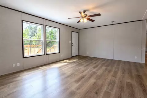 Living - 419 Lily Trl, Interlachen, FL 32148 photo 3 of 5