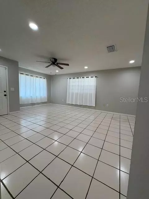 Living - 506 W 9th St, Frostproof, FL 33843 photo 2 of 4