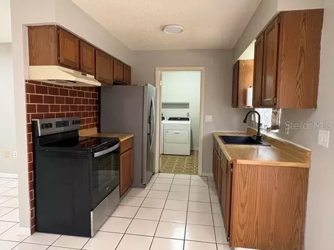 Kitchen - 506 W 9th St, Frostproof, FL 33843 photo 1 of 4