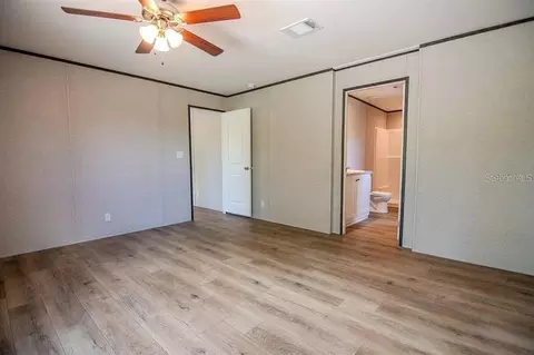 Bedroom - 19732 NW 280th St, Okeechobee, FL 34972 photo 4 of 5