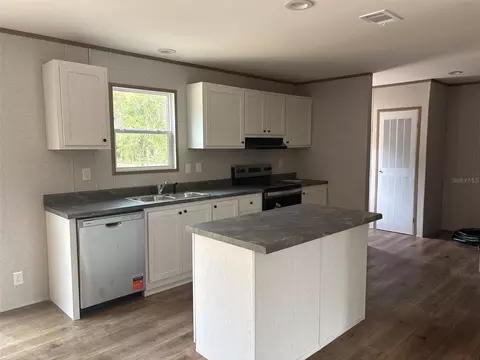 Kitchen - 16854 NW 254th St, Okeechobee, FL 34972 photo 1 of 2
