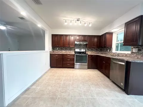 Kitchen - 137 Lowell Rd, Winter Haven, FL 33884 photo 1 of 2