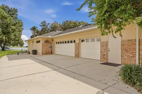 Exterior - 557 Sutton Rd, Auburndale, FL 33823 photo 3 of 14