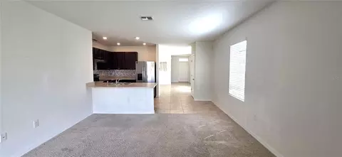 Living - 156 Eagleview Loop, Davenport, FL 33837 photo 5 of 6