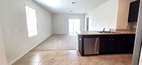 Living - 156 Eagleview Loop, Davenport, FL 33837 photo 4 of 6