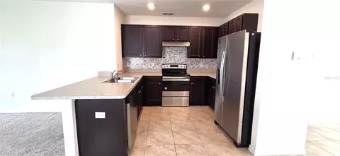 Kitchen - 156 Eagleview Loop, Davenport, FL 33837 photo 2 of 3