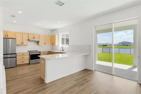 Kitchen - 9395 Sandy Bluffs Cir, Parrish, FL 34219 photo 1 of 9