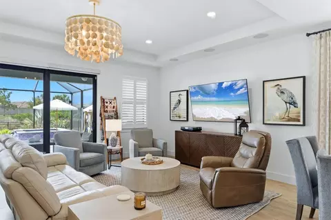 Living - 18645 Midsummer Pl, Venice, FL 34293 photo 1 of 2