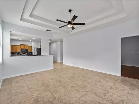 Living - 11631 Dancing River Dr, Venice, FL 34292 photo 10 of 11