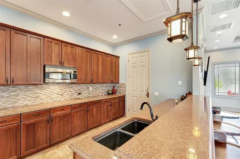 Kitchen - 7734 108th Avenue Cir E, Parrish, FL 34219 photo 10 of 11