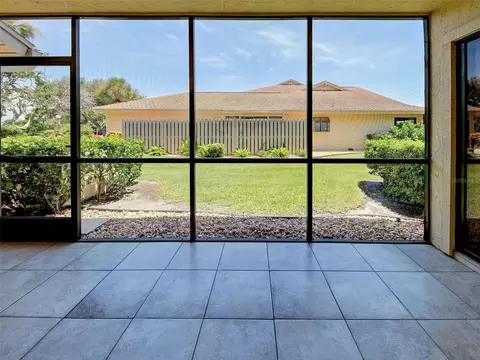 Exterior - 2004 Longpointe Cir #E2, Venice, FL 34293 photo 6 of 13