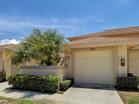 Exterior - 2004 Longpointe Cir #E2, Venice, FL 34293 photo 2 of 13