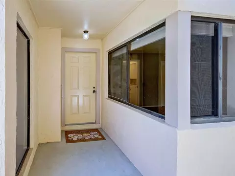 Exterior - 2004 Longpointe Cir #E2, Venice, FL 34293 photo 4 of 13