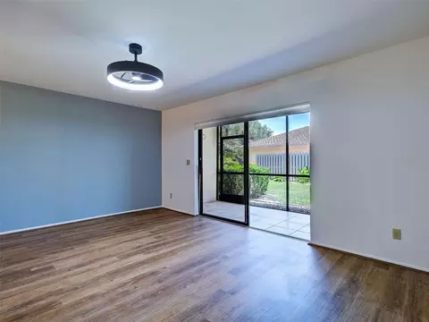Living - 2004 Longpointe Cir #E2, Venice, FL 34293 photo 7 of 9