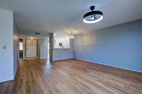 Living - 2004 Longpointe Cir #E2, Venice, FL 34293 photo 5 of 9
