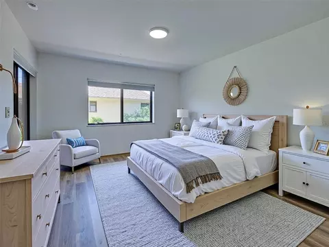 Bedroom - 2004 Longpointe Cir #E2, Venice, FL 34293 photo 6 of 7