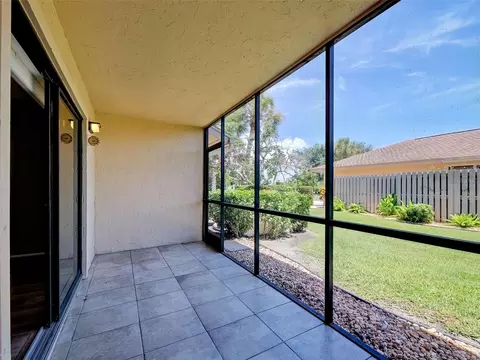 Exterior - 2004 Longpointe Cir #E2, Venice, FL 34293 photo 5 of 13