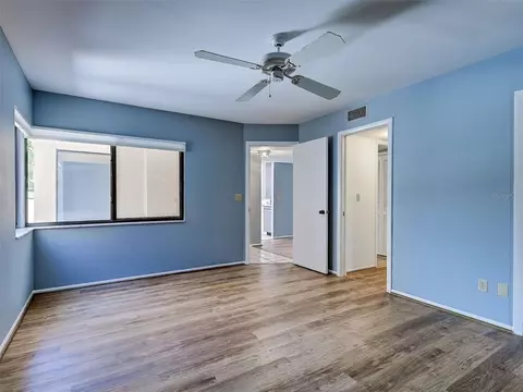 Bedroom - 2004 Longpointe Cir #E2, Venice, FL 34293 photo 2 of 7