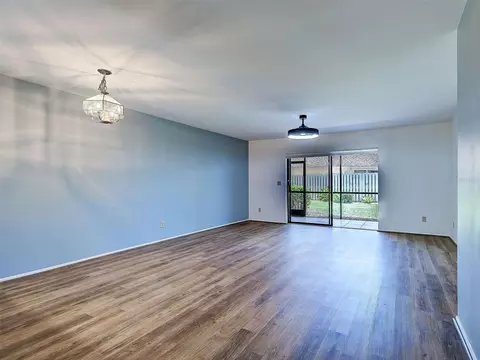 Living - 2004 Longpointe Cir #E2, Venice, FL 34293 photo 1 of 9