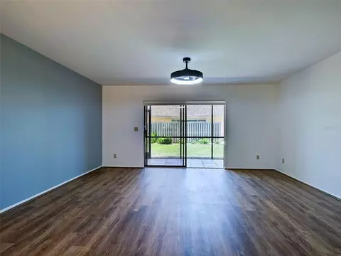 Living - 2004 Longpointe Cir #E2, Venice, FL 34293 photo 2 of 9