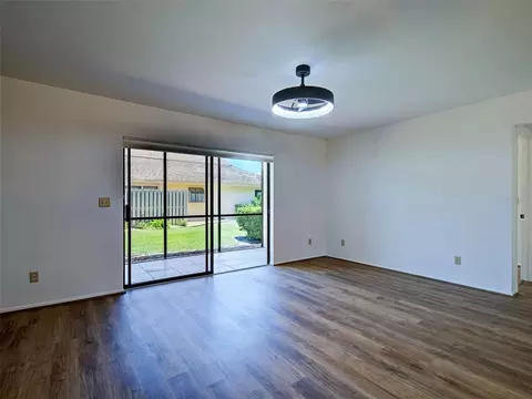 Living - 2004 Longpointe Cir #E2, Venice, FL 34293 photo 3 of 9