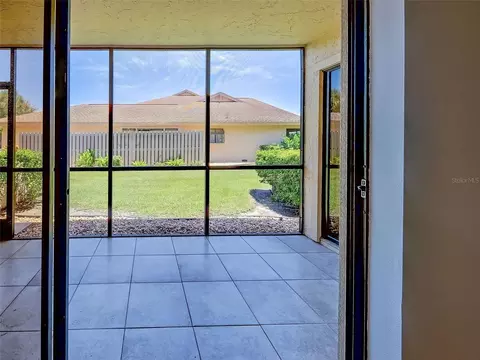 Exterior - 2004 Longpointe Cir #E2, Venice, FL 34293 photo 7 of 13