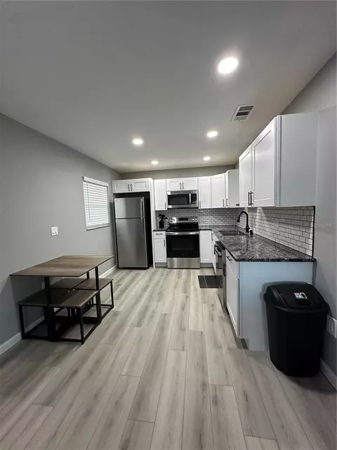 Kitchen - 460 E Base Ave #129, Venice, FL 34285 photo 2 of 3