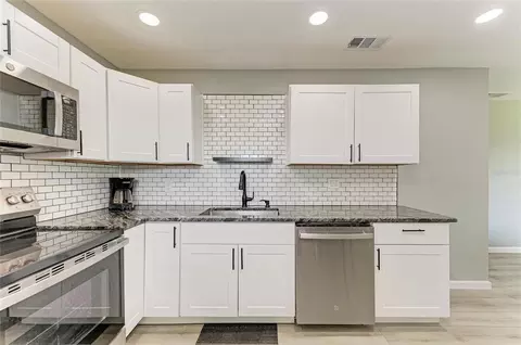 Kitchen - 460 E Base Ave #129, Venice, FL 34285 photo 4 of 4