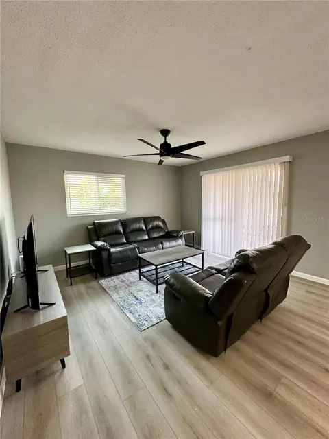 Living - 460 E Base Ave #129, Venice, FL 34285 photo 2 of 3