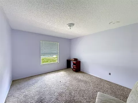 Bedroom - 9320 SE Maricamp Rd, Ocala, FL 34472 photo 4 of 8