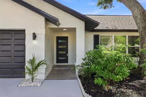 Exterior - 6909 9th Ct E, Sarasota, FL 34243 photo 4 of 11