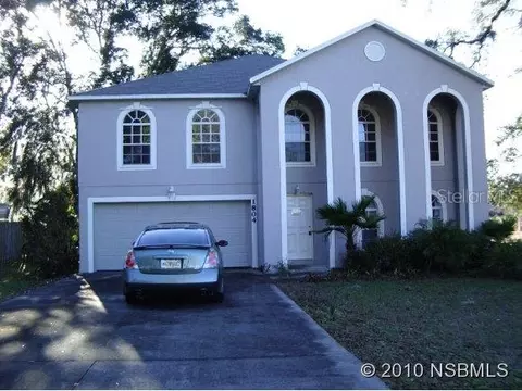 1804 Pine Tree Dr, Edgewater, FL 32141 photo 1