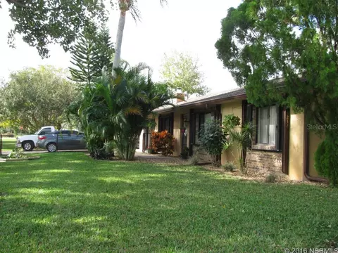 3232 Pine Tree Dr, Edgewater, FL 32141 photo 1