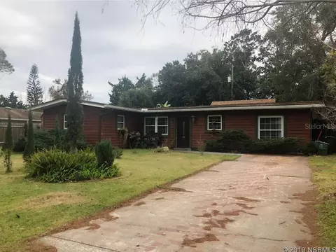 3128 Pine Tree Dr, Edgewater, FL 32141 photo 1